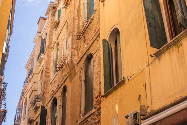 Fototapeta Landscape of Venice views, concept of vacation in Italy. Old part of city center. Ideas for journey.