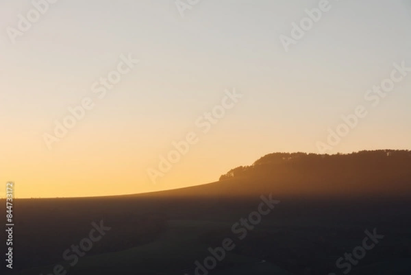 Fototapeta sunset in the mountains