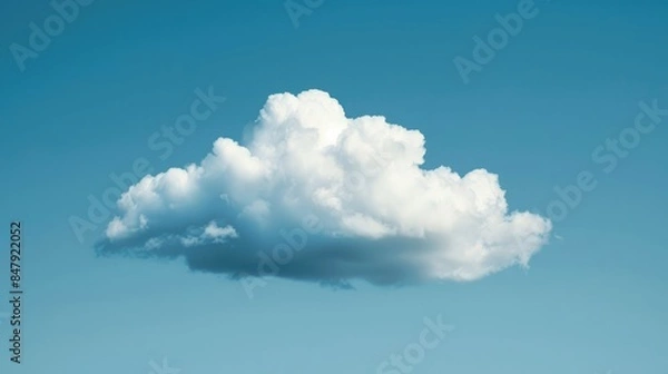 Fototapeta Fluffy white cloud in a clear blue sky with clouds