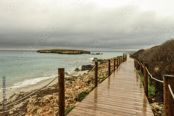 Fototapeta Tranquil Shoreline at Sant Adeodat Beach, Menorca