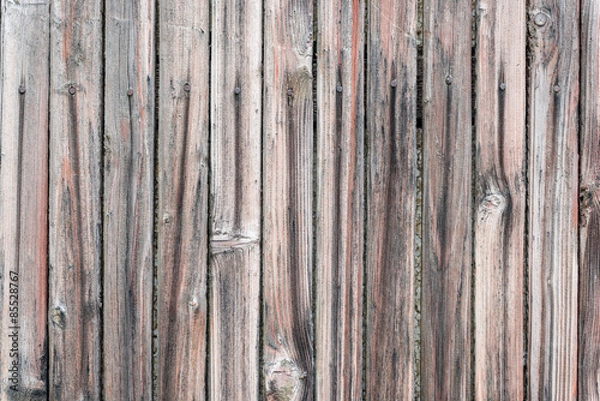 Fototapeta Wooden texture of brown color with scratches and cracks, which can be used as a background