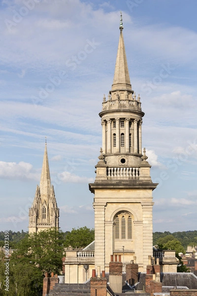 Fototapeta Church tower of Lincoln College library in foreground with University Church of St Mary behind in Oxford England 