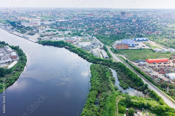 Fototapeta Communist street along Tura river. Tyumen. Russia