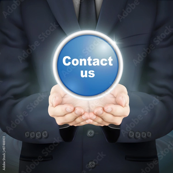 Obraz businessman holding contact us icon