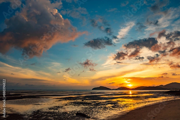 Fototapeta Landscape Long exposure of majestic clouds in the sky sunset or sunrise over sea with reflection in the tropical sea.Beautiful cloudscape scenery.Amazing light of nature Landscape nature background