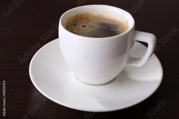 Fototapeta Cup of coffee on table close up