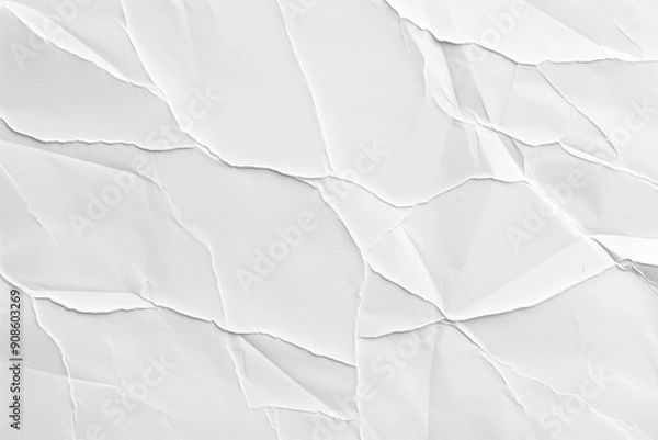 Fototapeta Close-up of crumpled white paper with rough texture, visible creases, and folds creating abstract pattern. Folded surface focuses attention on intricate details.