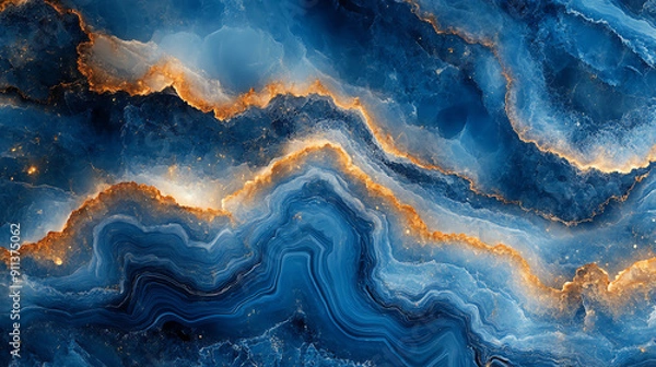 Fototapeta  An abstract design of swirling blue and gold patterns, resembling marble or agate stone.