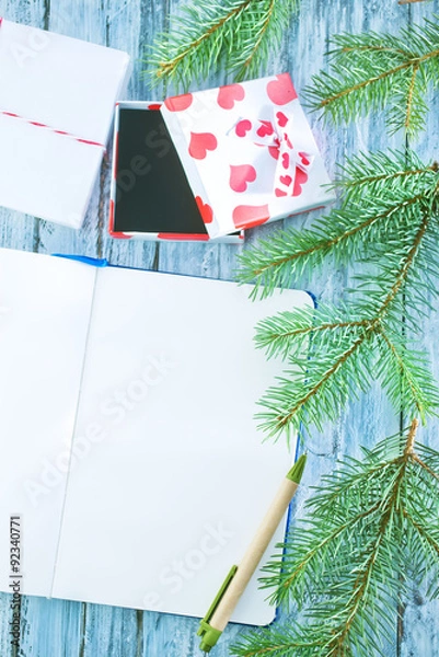 Fototapeta notebook and christmas decoration