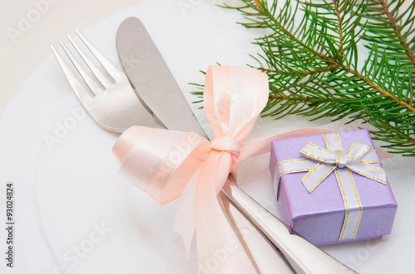 Fototapeta Christmas table place setting with christmas decorations