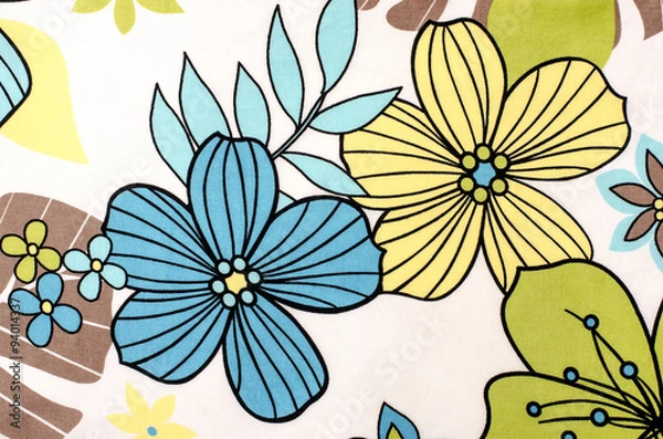 Fototapeta Floral pattern on white fabric. Colorful exotic blue and yellow flowers print as background.