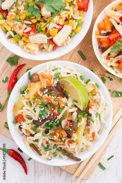 Fototapeta noodles with vegetables and greens, fried rice with tofu