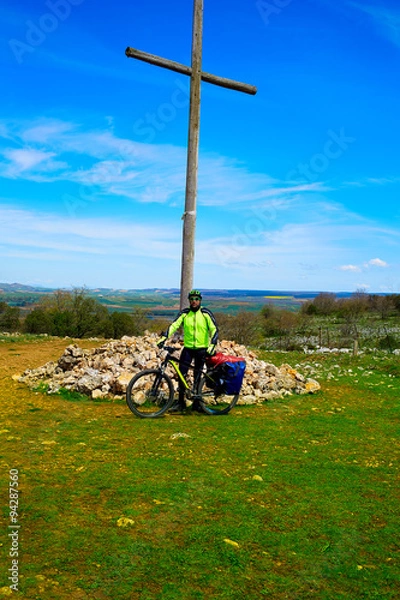 Fototapeta Cruz de Atapuerca cross in Saint James Way bike