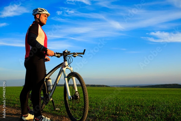 Fototapeta Mountain Bike cyclist riding outdoor