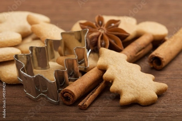 Fototapeta Christmas sweets on wooden background