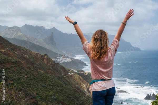 Fototapeta Woman hiker watching beautiful costal scenery. - Tenerife, Canary Islands, Spain. coast view,