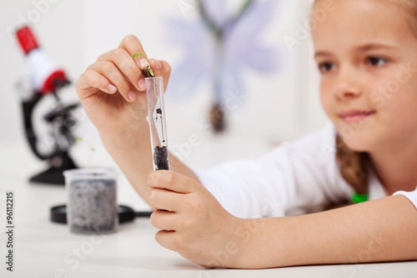 Fototapeta Young student in elementary school science class