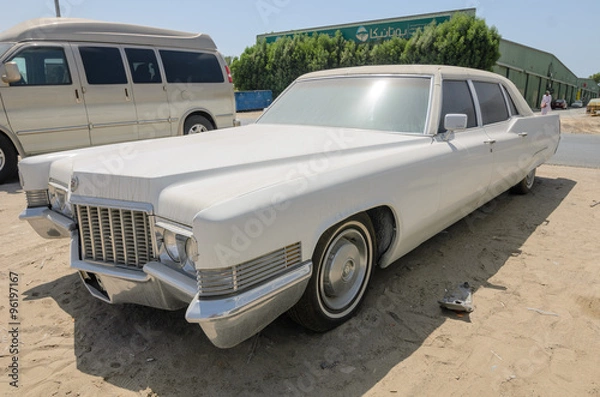 Fototapeta  Vintage american Cadillac fleetwood limousine left abandoned