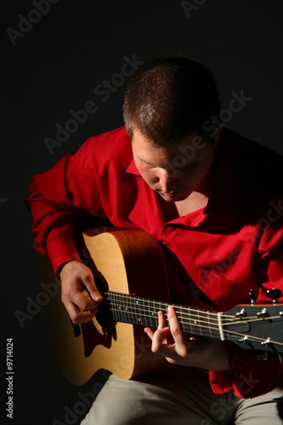 Fototapeta Guitarist in red shirt