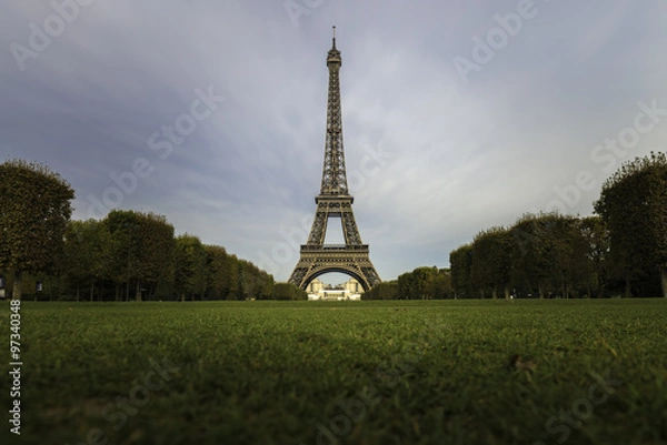 Fototapeta Eiffel tower with greenery foreground in clear sky day