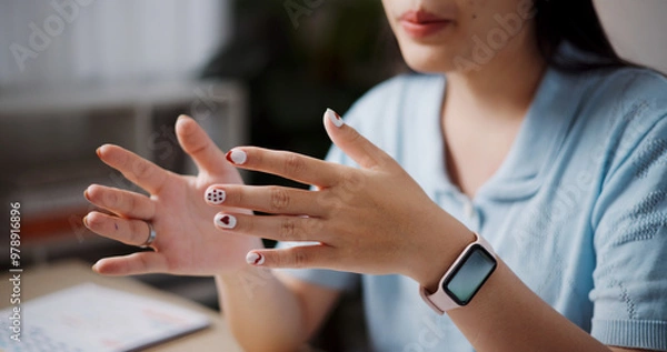 Fototapeta Selective focus, Hand of female freelancer having video call meeting with team and presenting project with laptop in home office. Work from home ,Remote work