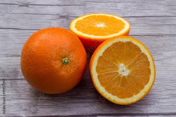 Fototapeta Frische aufgeschnittene Orangen in Nahaufnahme